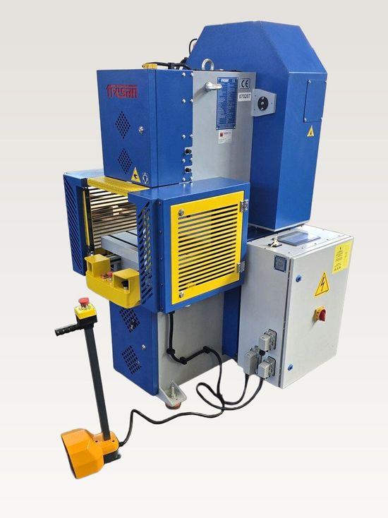 Fresan eccentric press, 10 to 20 ton range, angled view showing the electrical control cabinet, foot pedal and safety cage.