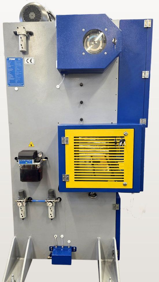 Fresan FP 30P eccentric press, left-side view showing the air regulator, automatic lubricator, side access covers and cam box.