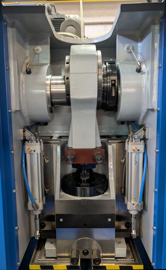 Fresan FP 40P eccentric press with the front guard open, exposing the ram, slides, crankshaft assembly, pneumatic counterbalance and work table.