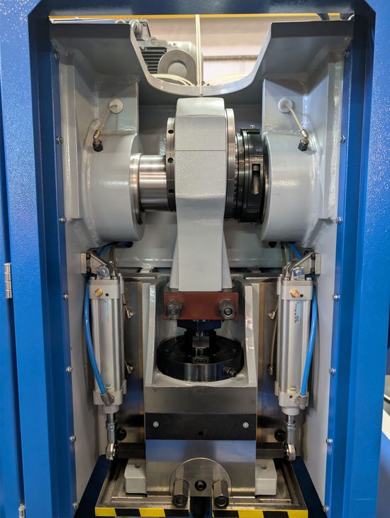 Fresan FP 60P eccentric press with the front guard open, exposing the ram, slides, crankshaft assembly and pneumatic counterbalance cylinders.