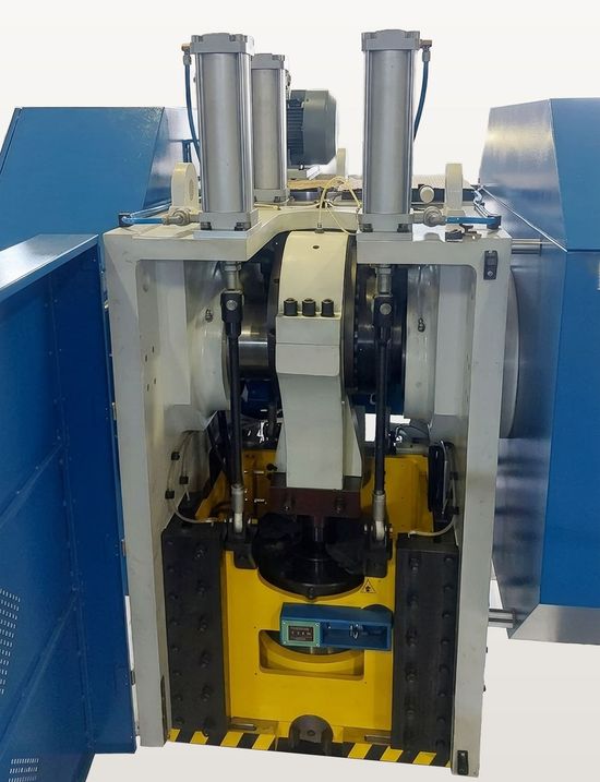 Fresan FP 200P eccentric press with the front guard open, close-up of the ram, crankshaft assembly and pneumatic counterbalance cylinders.